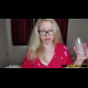 A plump, blonde, British girl with glasses talks to the camera in a pink heart top, holds a glass, and sits with her legs open on a bed while she takes a shit. Presented in 720P HD. 407MB, MP4 file. Over 14 minutes.